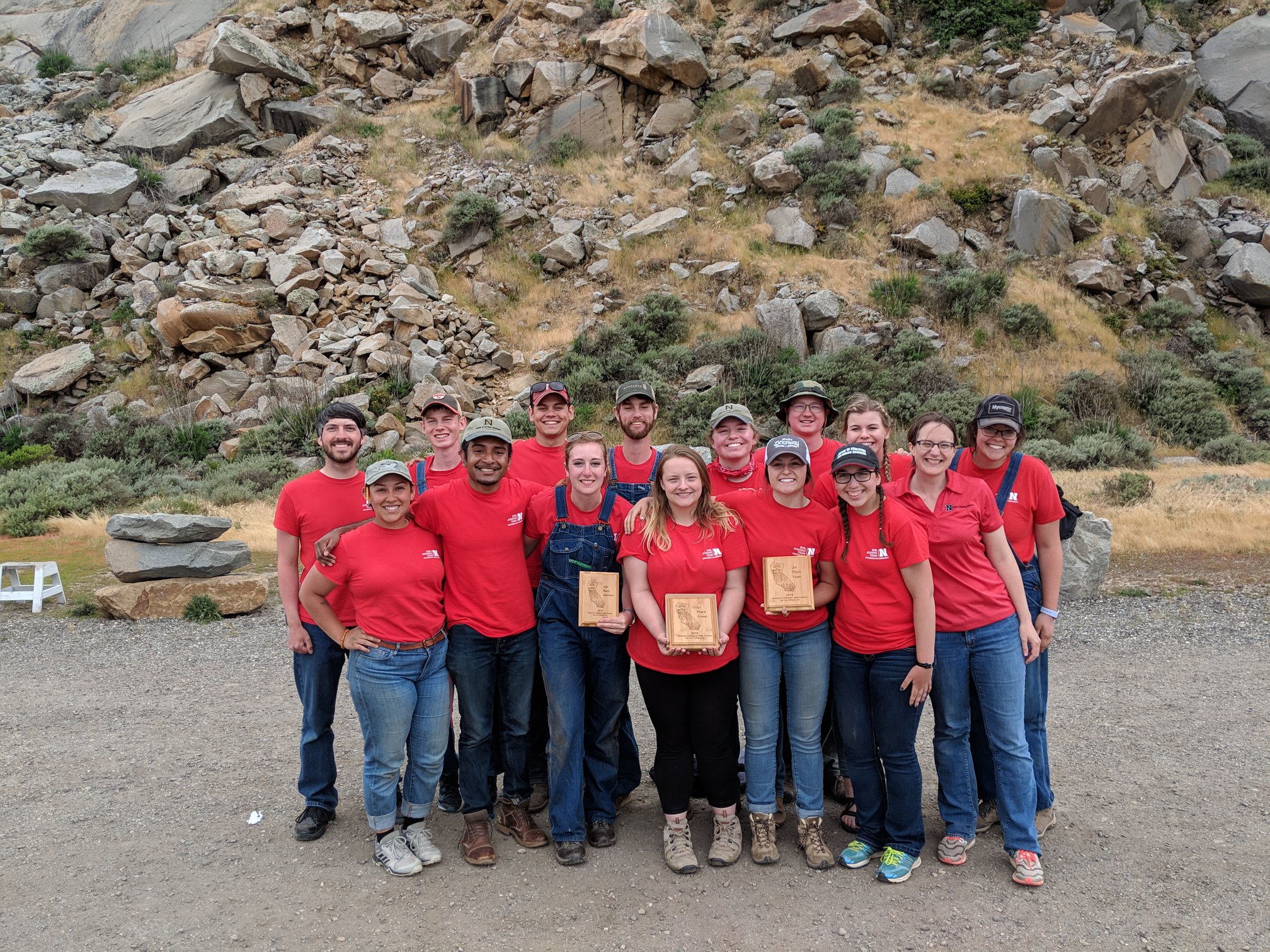 The UNL Soil Judging team holds their awards in California